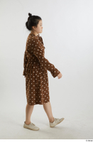   Aera  1 brown dots dress casual dressed side view walking white oxford shoes whole body 0004.jpg